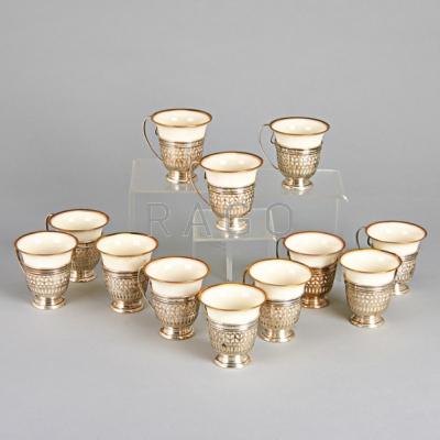 Appraisal: GORHAM STERLING DEMITASSE HOLDERS Twelve pierced holders and Lenox porcelain