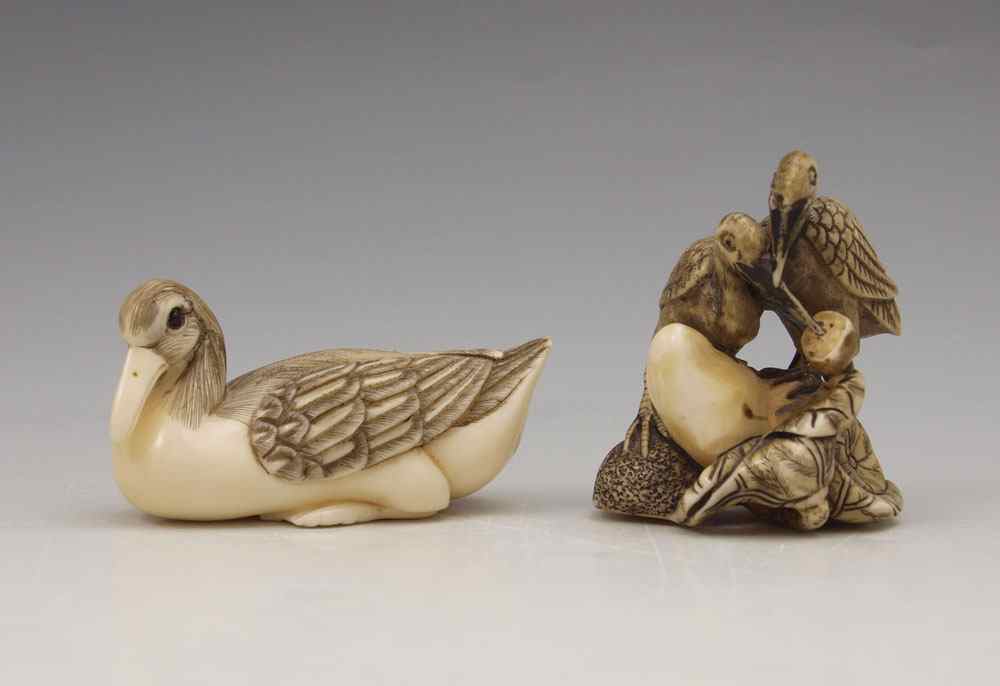 Appraisal: PIECE CARVED IVORY CRANES NETSUKE To include Seated crane signed