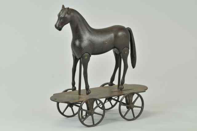 Appraisal: IVES WALKING HORSE ON PLATFORM IVES c japanned cast iron