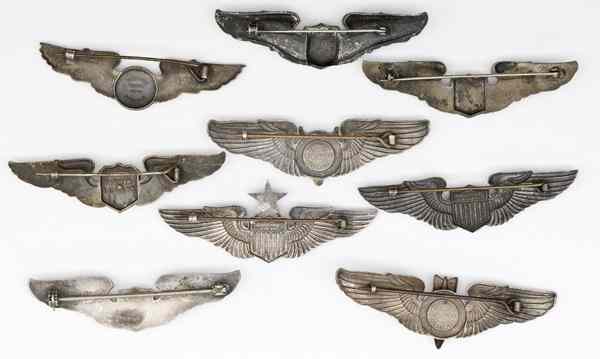 Appraisal: US WWII Assorted Theater-Made Air Corps Wings Included in this