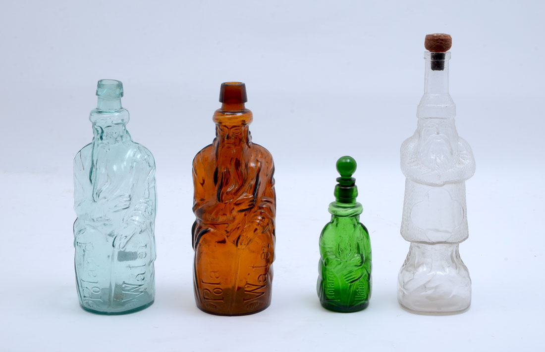 Appraisal: COLLECTION OF ANTIQUE FATHER CHRISTMAS BOTTLES An assembled collection of