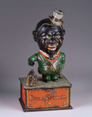 Appraisal: STUMP SPEAKER MECHANICAL BANK The bank depicts a black carpet