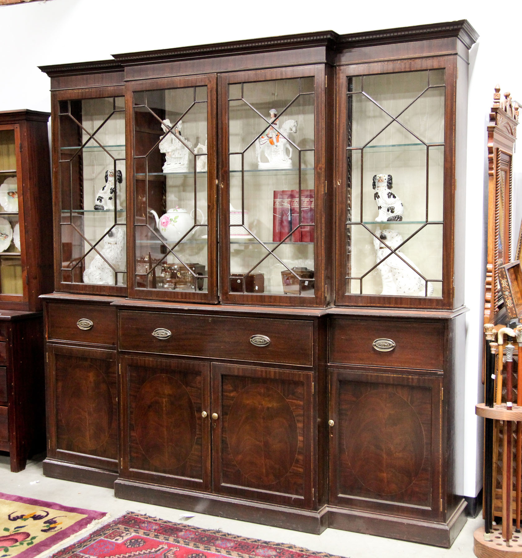 Appraisal: BREAKFRONT SECRETARY BOOKCASE Probably English first quarter th century Mahogany