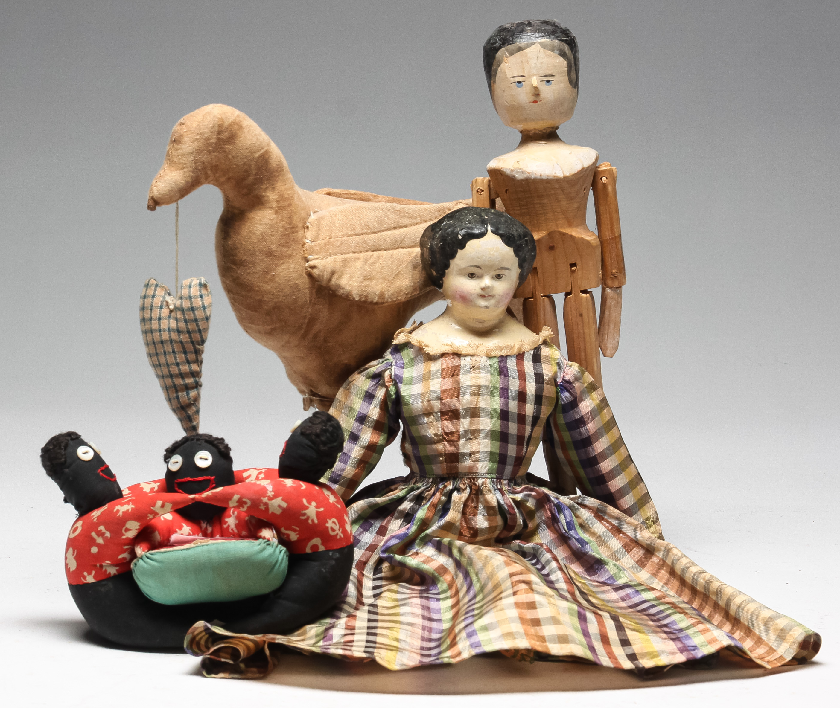 Appraisal: TWO DOLLS AND TWO PINCUSHIONS Nineteenth and th centuries Doll