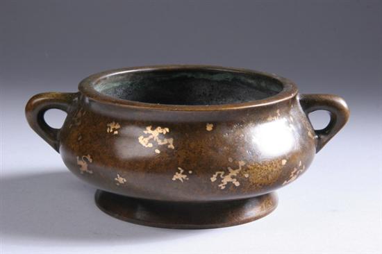 Appraisal: CHINESE SPLASHED GOLD BRONZE CENSER Republic period With two loop-form