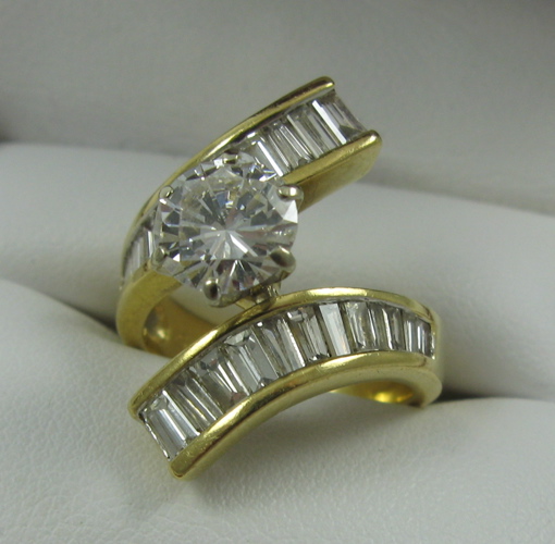 Appraisal: DIAMOND RING WITH GIA APPRAISAL the K yellow gold crossover