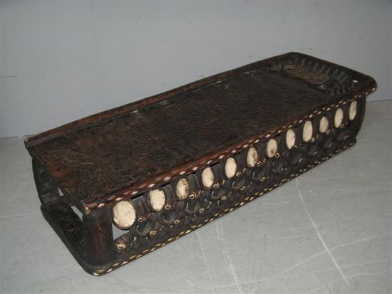 Appraisal: Ceremonial pygmy tribe carved bed made from one piece of