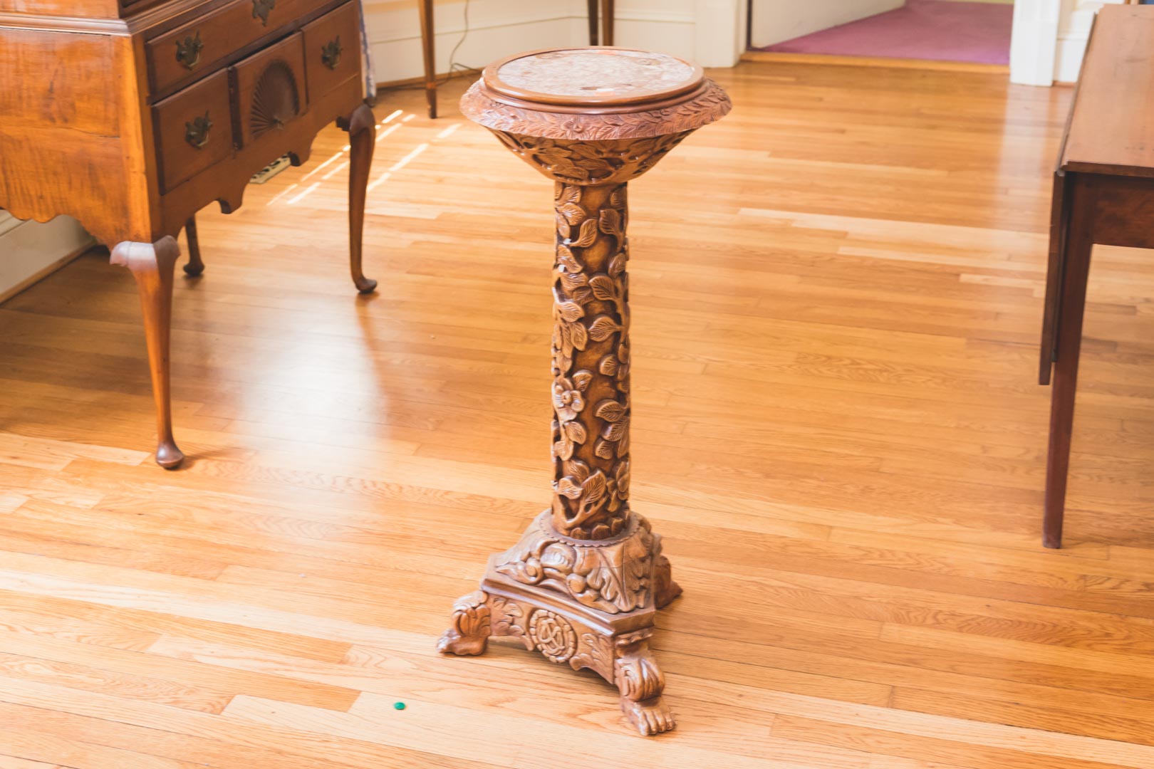 Appraisal: Chinese carved wood pedestal with inset marble top in H