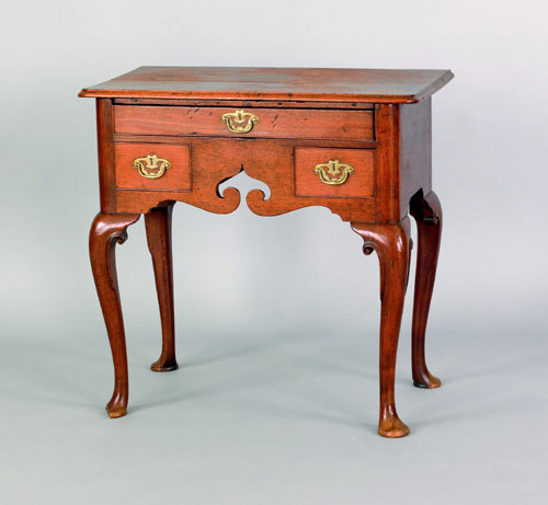 Appraisal: George II mahogany dressing table ca the rectangular top with