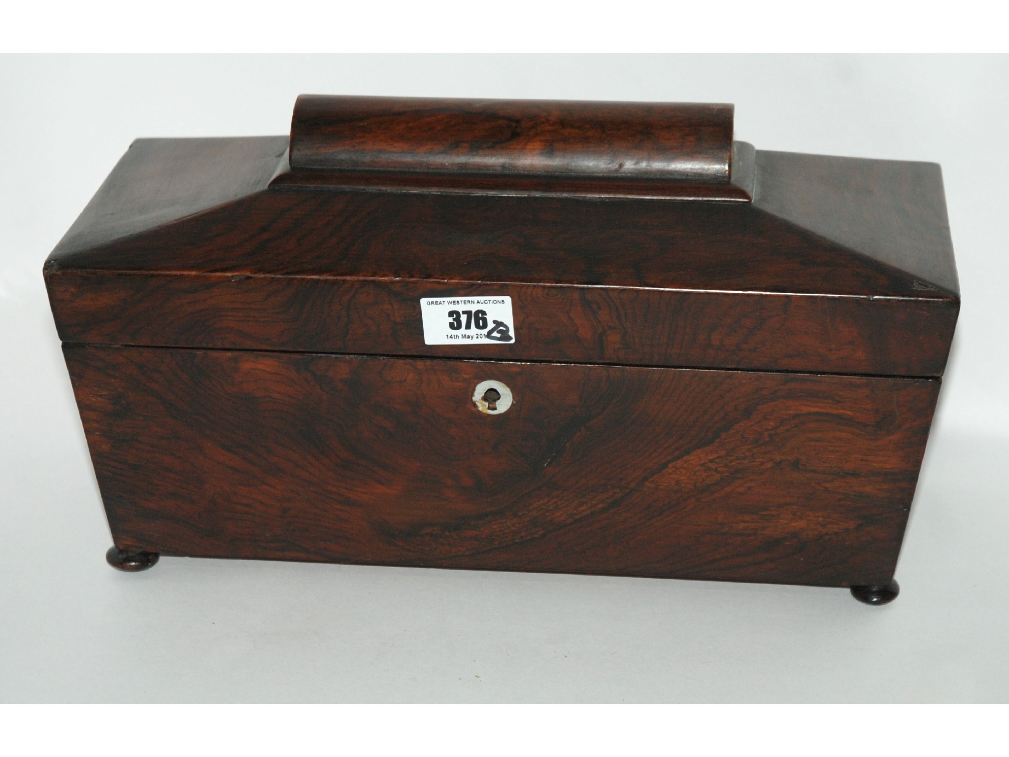 Appraisal: A Victorian rosewood sarcophagus shaped tea caddy oval bread box