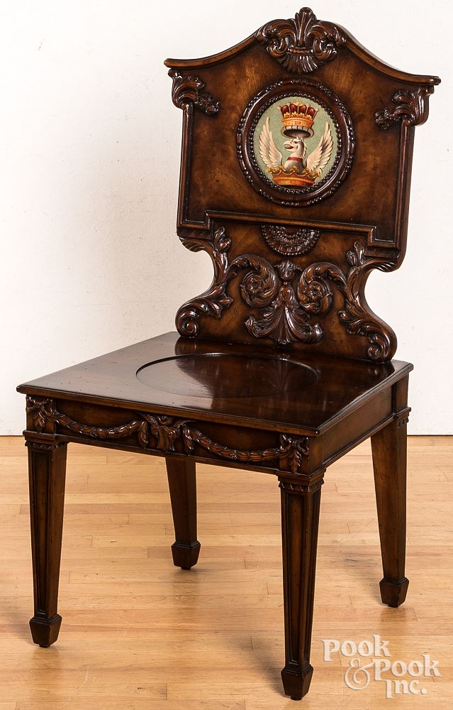 Appraisal: Italian mahogany hall chair Italian mahogany hall chair with heraldic