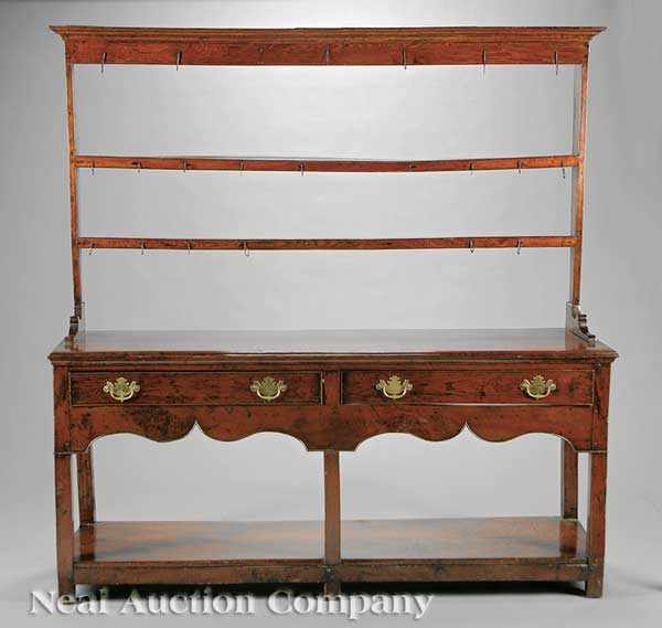 Appraisal: An Antique English Carved Oak Dresser the associated plate rack