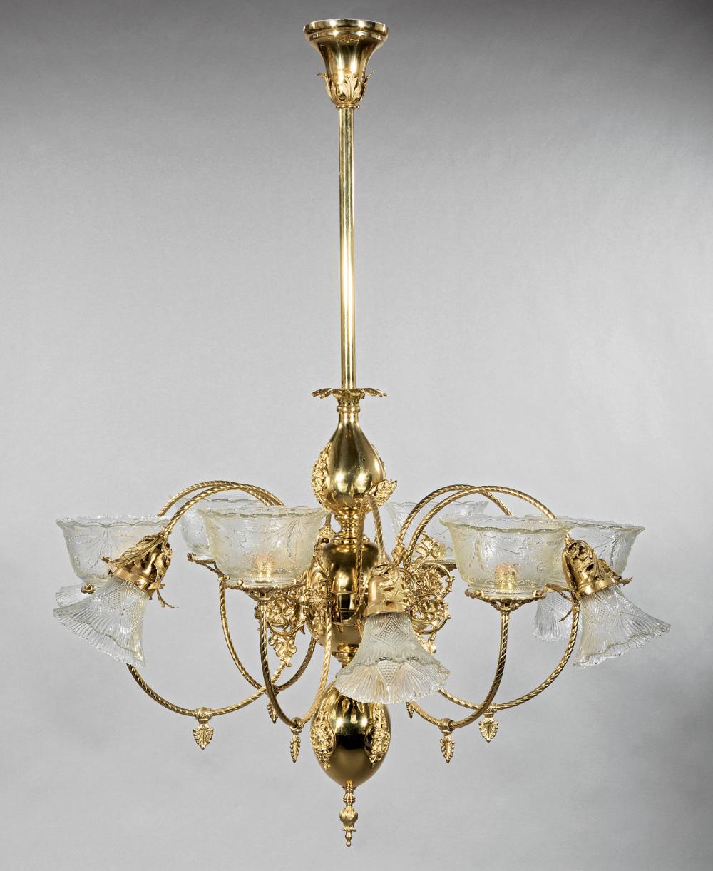 Appraisal: American Brass Twelve-Light Chandelier th c vasiform standard h in