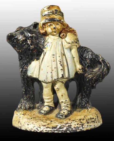 Appraisal: Cast Iron Girl with Shaggy Dog Doorstop Description Made by