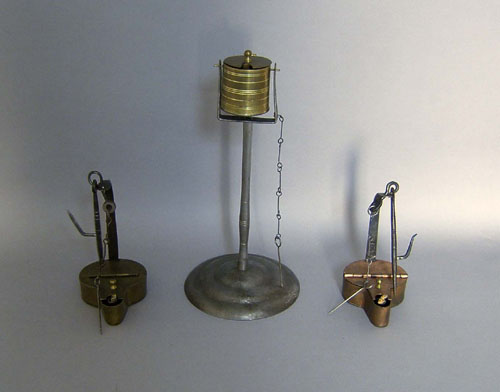 Appraisal: Two reproduction betty lamps h and h together with a