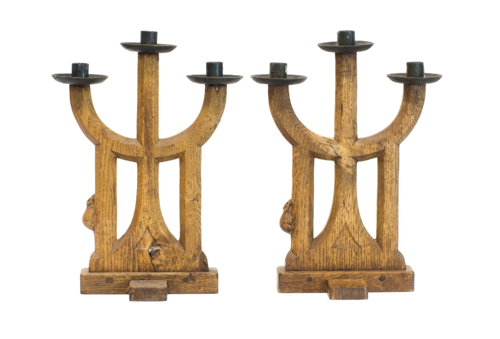 Appraisal: A pair of carved oak triple sconce candelabra by Robert