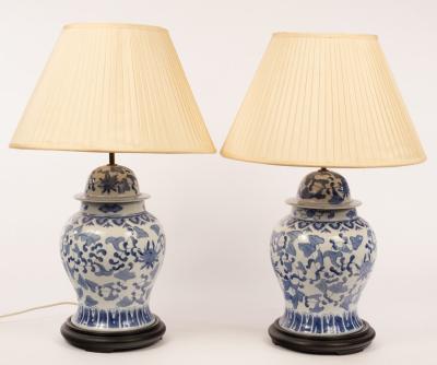 Appraisal: A pair of Chinese style blue and white lamps cm