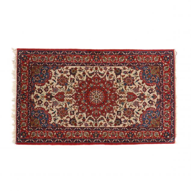 Appraisal: NORTHWEST PERSIAN AREA RUG Beige field with center red medallion