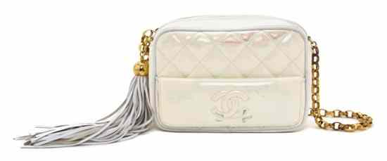 Appraisal: A Chanel Cream Patent Leather Quilted Bag with chainlink strap