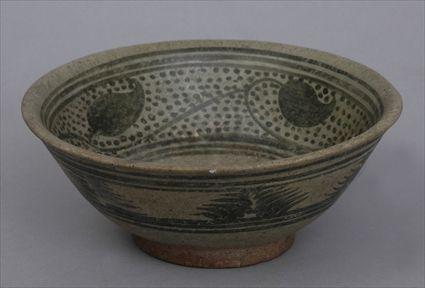 Appraisal: THAI SAWANKALOKE BLACK AND WHITE-GLAZED POTTERY BOWL The interior with