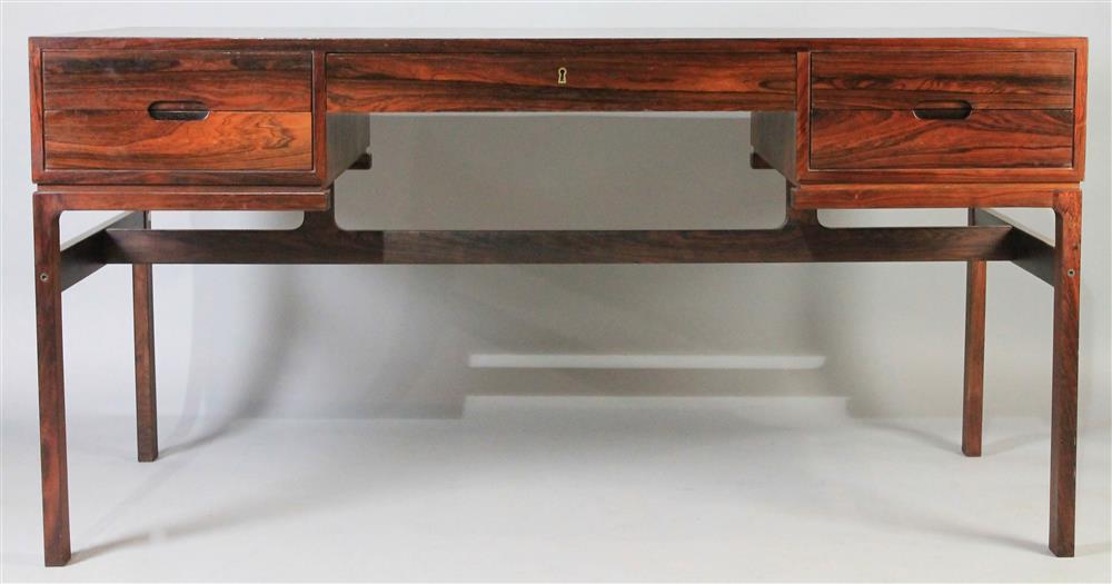 Appraisal: DANISH MODERN ROSEWOOD DESK having a rectangular top over a