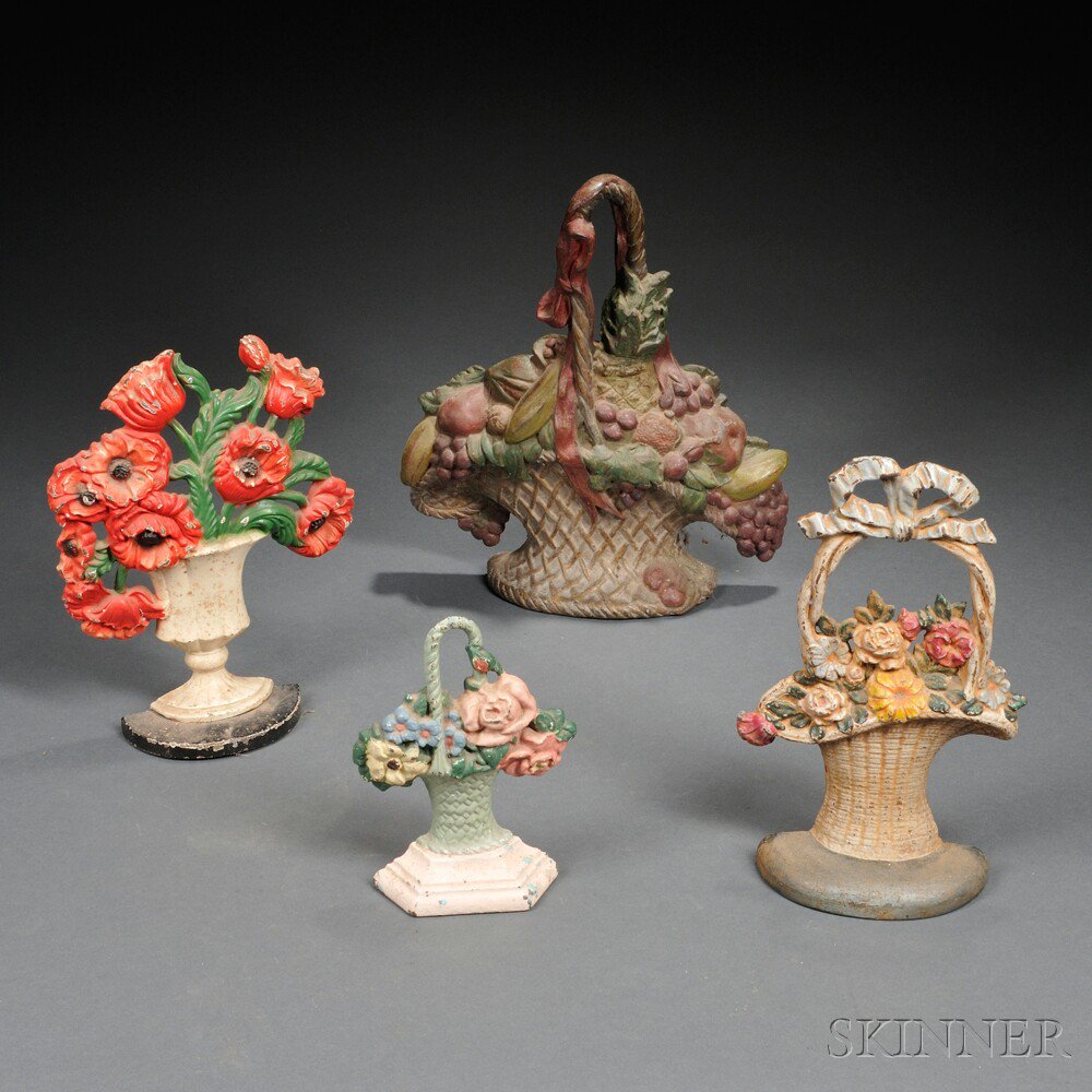 Appraisal: Three Painted Floral and a Fruit Basket Cast Iron Doorstops