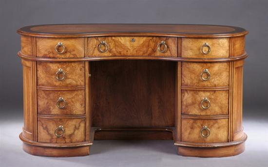 Appraisal: NEOCLASSICAL STYLE KIDNEY-SHAPED DESK late th century Generous writing surface