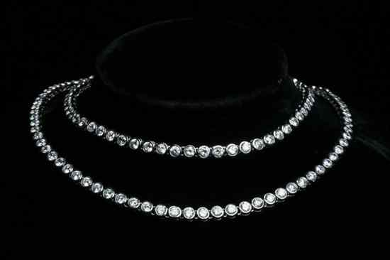 Appraisal: STERLING SILVER AND FAUX DIAMOND FLEXIBLE LINK LINE NECKLACE matched