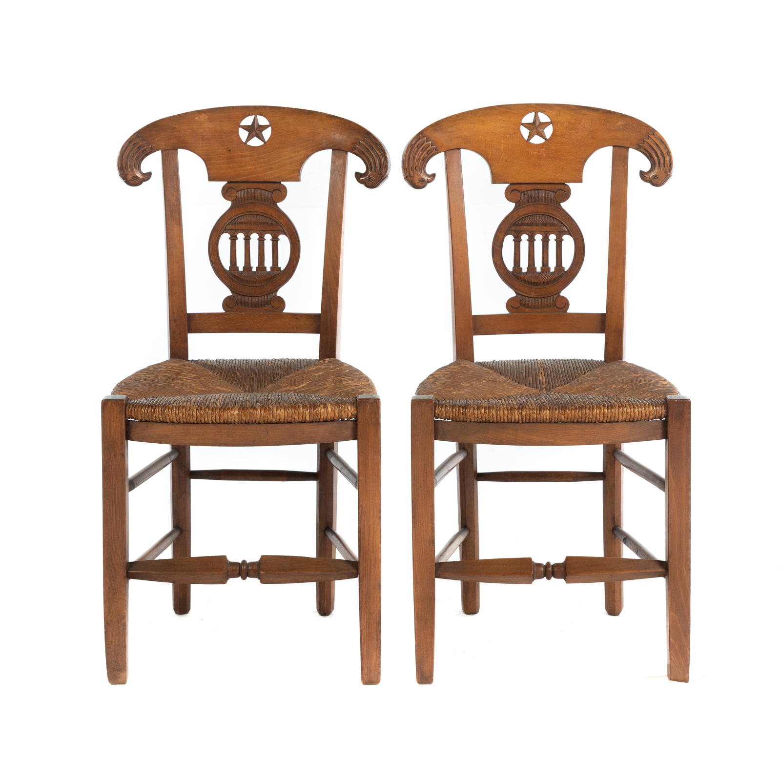 Appraisal: A PAIR OF FRENCH CARVED RUSH SEAT CHAIRS Late th