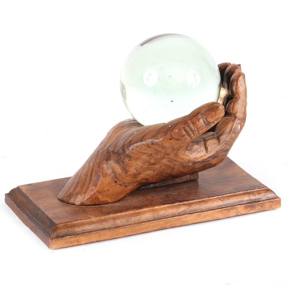 Appraisal: FORTUNE TELLER'S CRYSTAL CLEAR BLOWN GLASS BALL IN CARVED WOOD