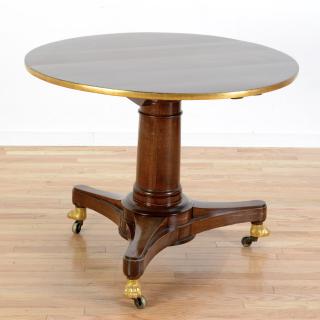 Appraisal: Regency parcel gilt mahogany breakfast table Regency parcel gilt mahogany