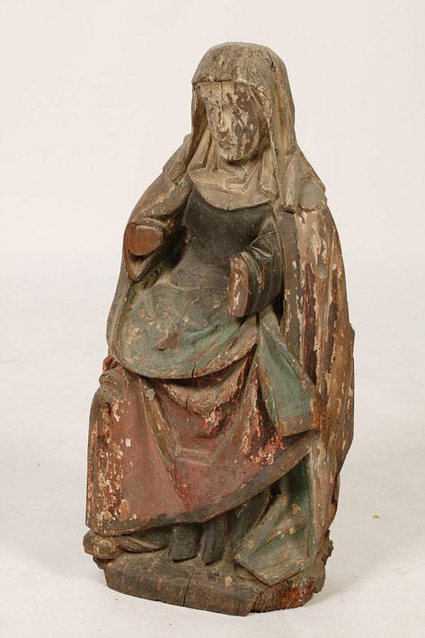 Appraisal: A NETHERLANDISH OAK FIGURE of a seated female saint with