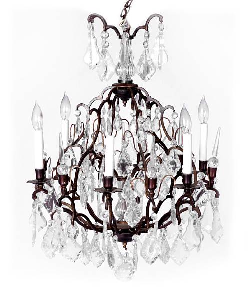 Appraisal: A patinated metal and crystal six light chandelier approximate height