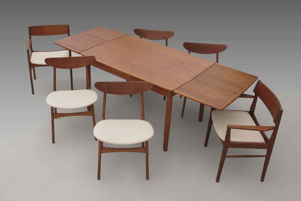 Appraisal: EDGAARD DANISH MODERN DINING TABLE CHAIRS The two arm chairs