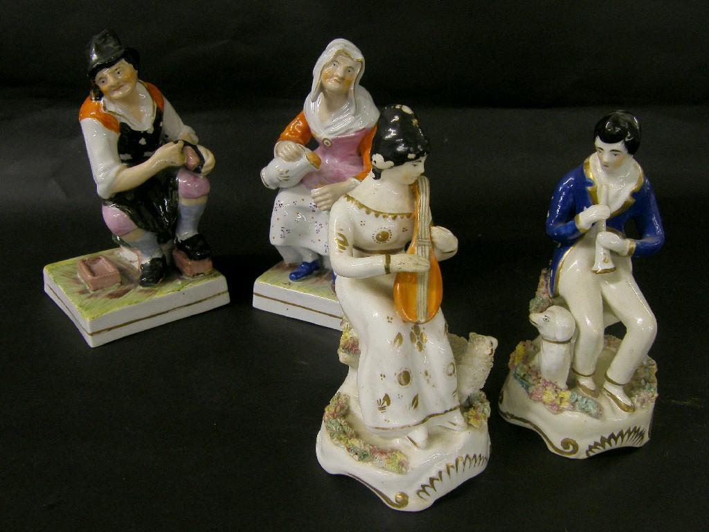 Appraisal: Pair of Staffordshire peasant seated figures modelled as a cobbler