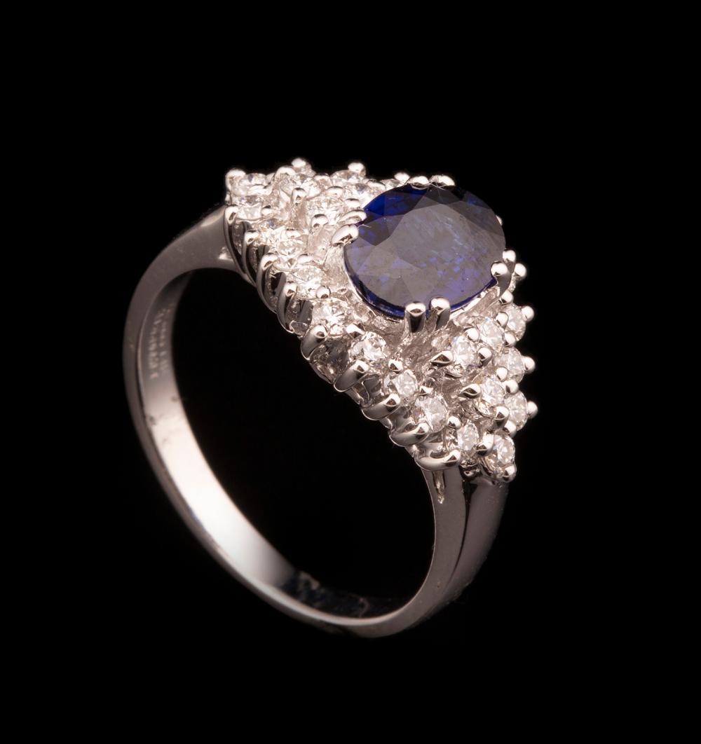 Appraisal: kt White Gold Sapphire and Diamond Ring center prong-set oval