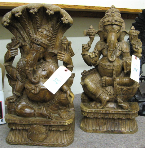 Appraisal: TWO EAST INDIAN WOOD SCULPTURES Ganesha the elephant god the