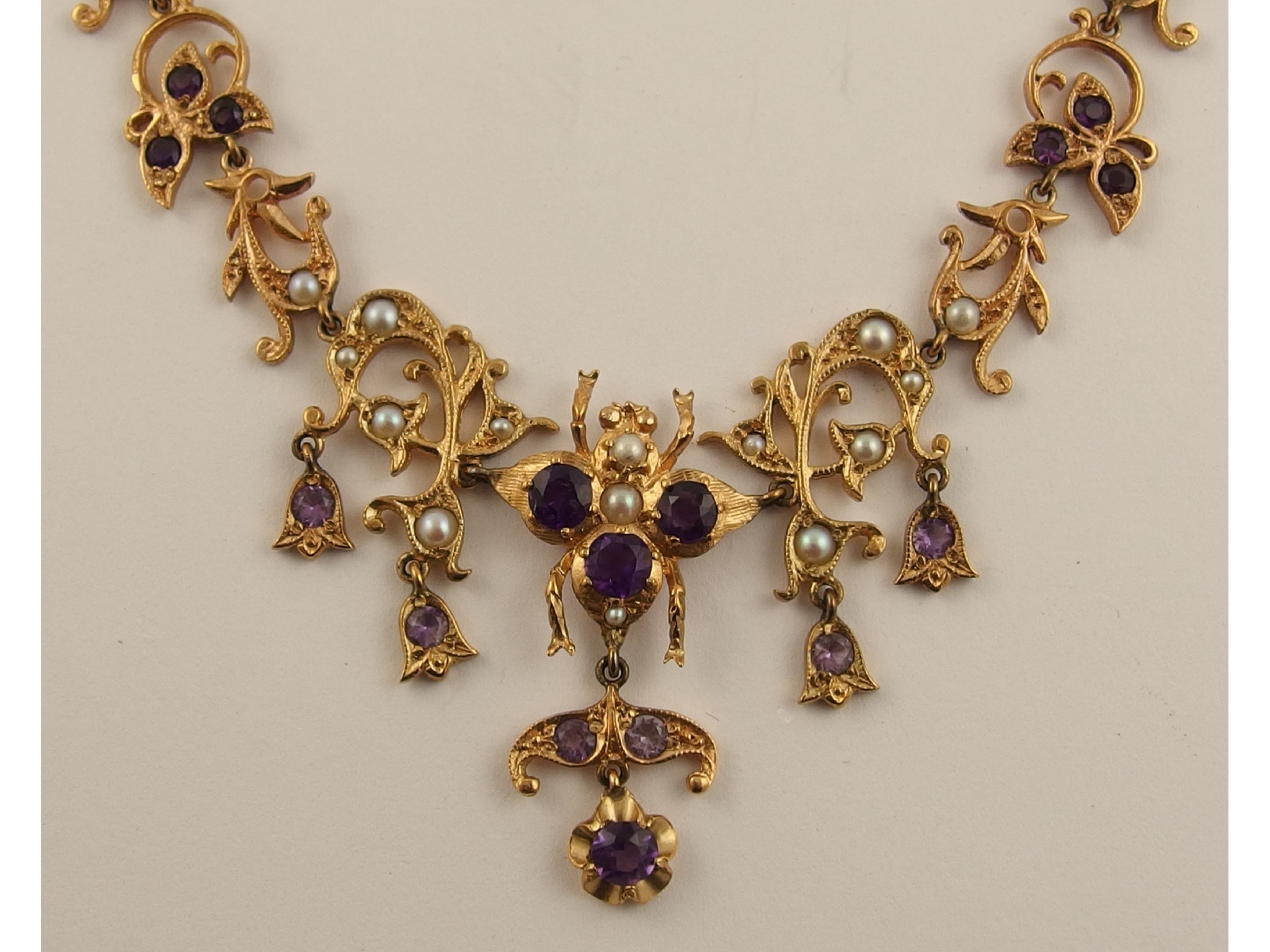 Appraisal: A ct amethyst set bee necklacethe central bee motif is