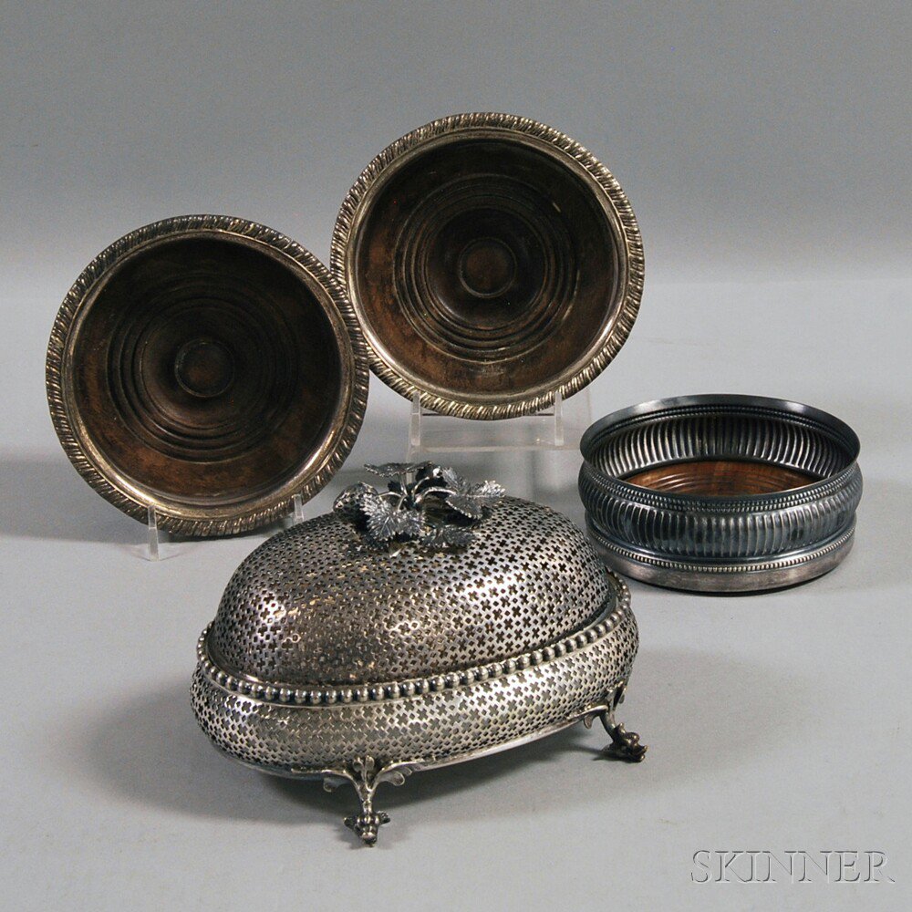 Appraisal: Three Silver-plated Wine Coasters and a Butter Dish a pair