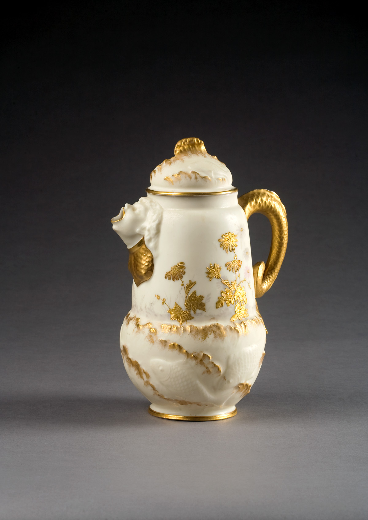 Appraisal: ENGLISH PORCELAIN IVORY-GROUND CHOCOLATE POT LATE NINENTEENTH CENTURY The bulbous