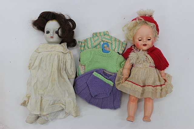 Appraisal: A 'S PLASTIC DOLL with some original clothing approximately cm