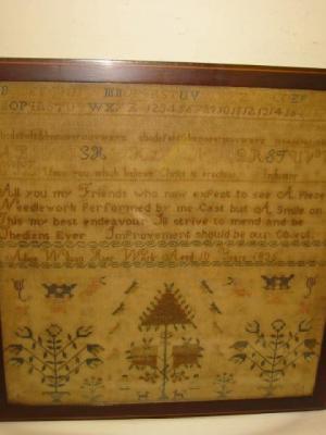 Appraisal: A WILLIAM IV WOOLWORK SAMPLER worked by Alic Wilson and