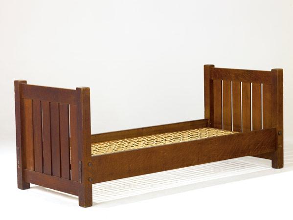 Appraisal: GUSTAV STICKLEY Knock-down slatted daybed with rope foundation Branded signature