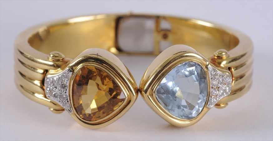 Appraisal: GOLD CITRINE AQUAMARINE AND DIAMOND HINGED CUFF BRACELET