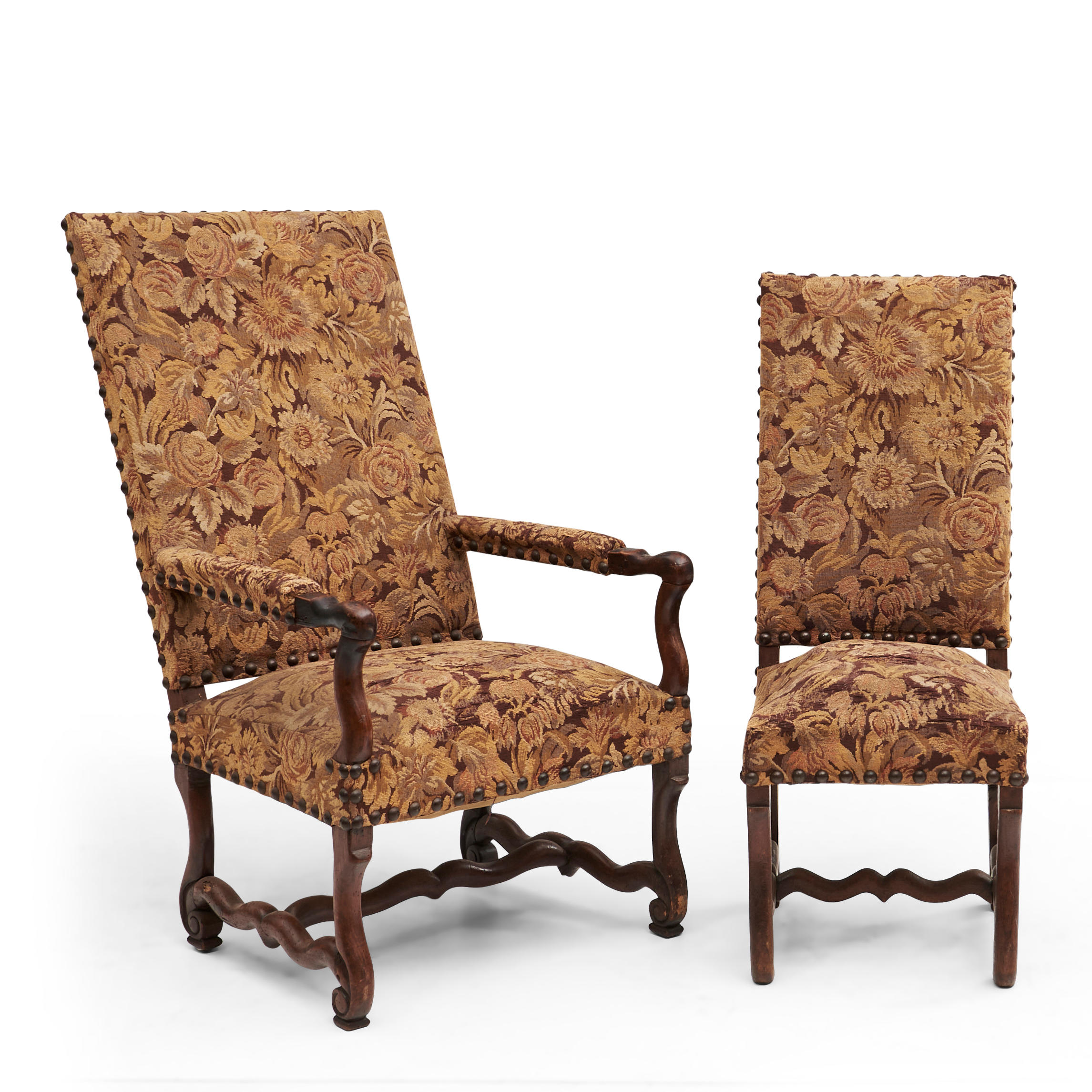 Appraisal: TWO FRENCH FRUITWOOD UPHOLSTERED CHAIRS th century a fauteuil and