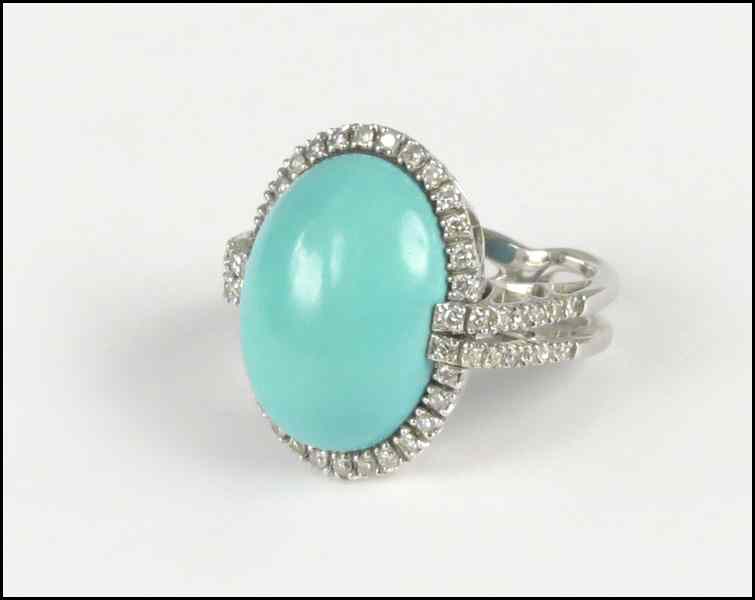 Appraisal: FAVERO KARAT WHITE GOLD DIAMOND AND TURQUOISE RING Diamonds are