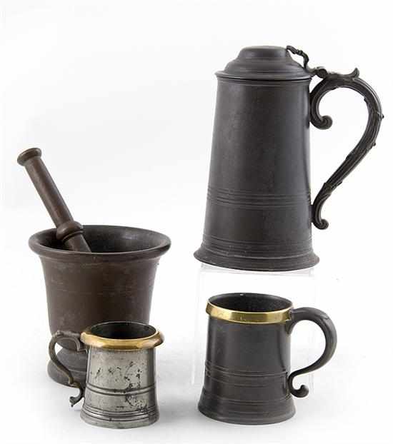 Appraisal: English pewter tankards mortar and pestle th century covered tankard