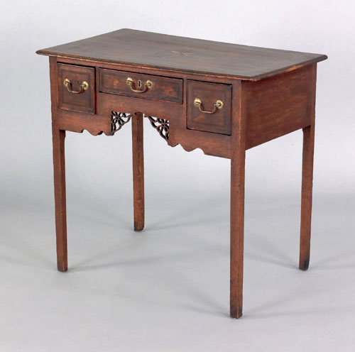 Appraisal: George III oak dressing table ca with star inlaid top