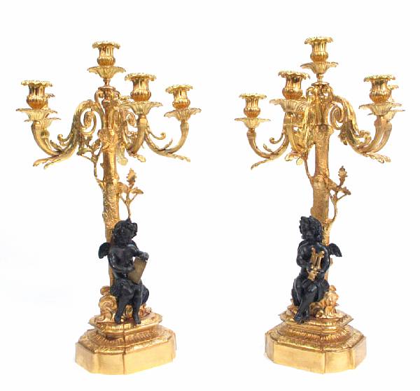 Appraisal: A pair of gilt metal six light candelabra with bronze