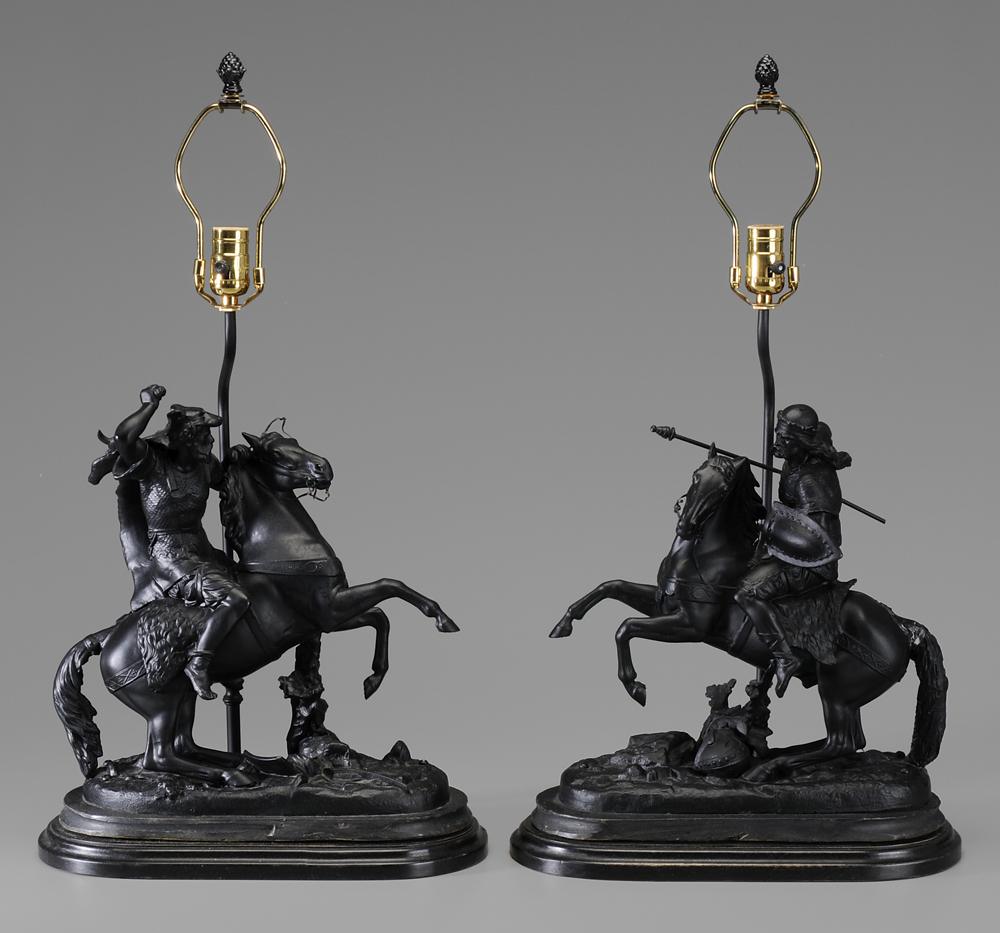 Appraisal: Pair Spelterware Lamp Bases modern soldiers on horses with ruins